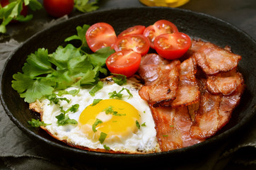 Appetizer fried egg with bacon
