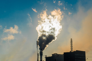 silhouette of a pipe with smoke