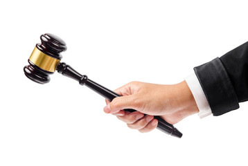 wooden gavel in hand.