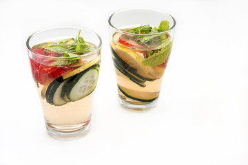 Dietary detox drink with lemon juice, strawberries and cucumber.