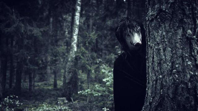 4K Halloween Horror Man with Pig Mask Behind Tree