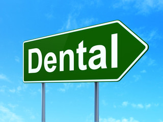 Healthcare concept: Dental on road sign background