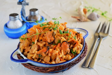 Fried rice with mussel, carrot and onion