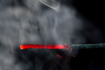 Burning fuse of a firecracker