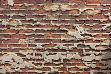 Very old dark brick wall
