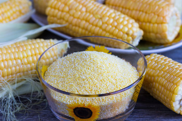 Corn flour. Ingredients for the preparation of bread from corn flour. Healthy food. © magic_rainbow