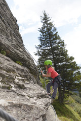 Young girl - children climbing on via ferrata