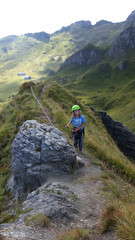 Young girl - children climbing on via ferrata