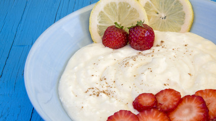 Lemon cream with strawberries.
