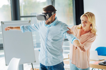 Fototapeta premium Relaxed man raising both arms