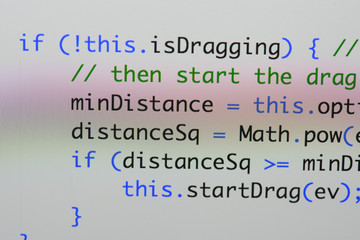 Real Java Script code developing screen. Programing workflow abstract algorithm concept. Closeup of...