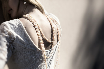 Woman with pearl necklace