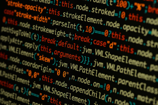 Real Java Script code developing screen. Programing workflow abstract algorithm concept. Closeup of Java Script and HTML code.