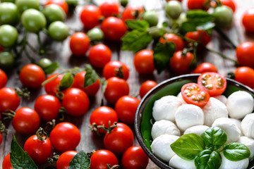 Basil, tomatoes and mozzarella for caprese salad, italian food and mediterranean food concept