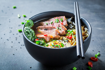 Tasty Ramen soup with chive and algae