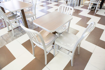 Set of modern silver wooden table and chairs