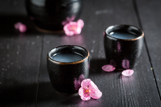 Delicious and good sake with blooming flowers