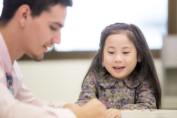 Portrait of Asian girl learning at classroom together, Children with education concept.