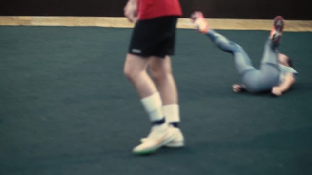 Training woman football team. Women play football. Female football match. The girl is falling. the woman failed