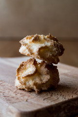Coconut Cookies on wooden surface.
