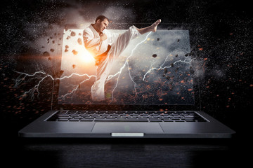 Man in kimono and glowing laptop. Mixed media © Sergey Nivens