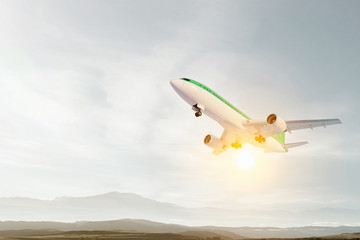 Airliner in sky. Mixed media