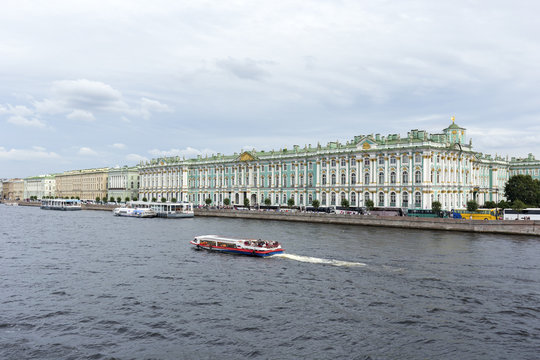 View of Palace embankment and the Hermitage Palace. The embankment of the Neva river , Saint Petersburg.