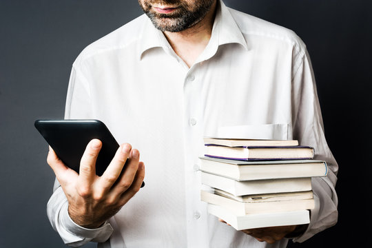 Men with Classic Books and modern electronic EBook Reader, White Shirt,