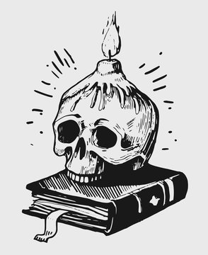 Skull with candles and a book