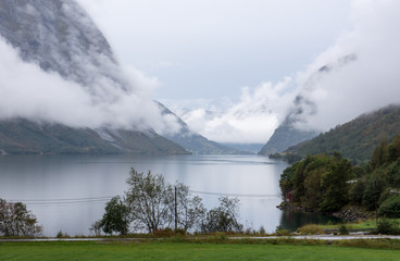 Foggy fjord landscape