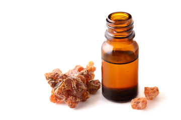 Myrrh and myrrh oil isolated on white