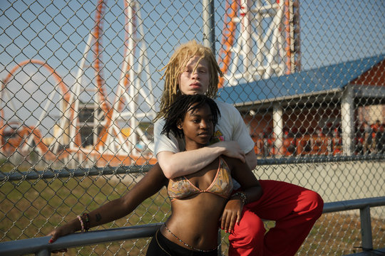 Lovers hanging out at amusement park