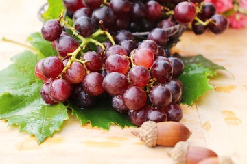 Fresh fruit grapes delicious on wood background