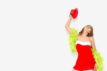sexy beautiful asian model young lady Pin Up girl posing on white background wearing winter red Santa Claus hat costume lovely cute pose