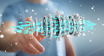 Businessman using floating modern gear mechanism 3D rendering