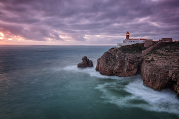 Lighthouse Cabo Sao Vicente before the storm and dramatic sky.