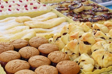 A lot of donut and strawberry jam