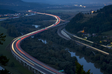 light paths on night highway near Povazska Bystrica, Slovakia