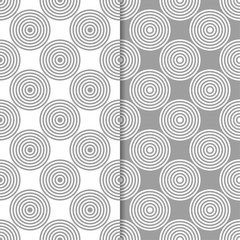 Gray and white geometric ornaments. Set of seamless patterns