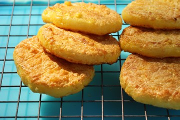 Grilled sticky rice with egg plating on stove
