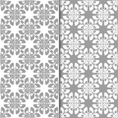 Badezimmer Foto Rückwand White and gray floral backgrounds. Set of seamless patterns © Liudmyla
