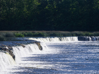 Waterfall Ventas Rumba on river Venta at Kuldiga, Latvia, selective focus