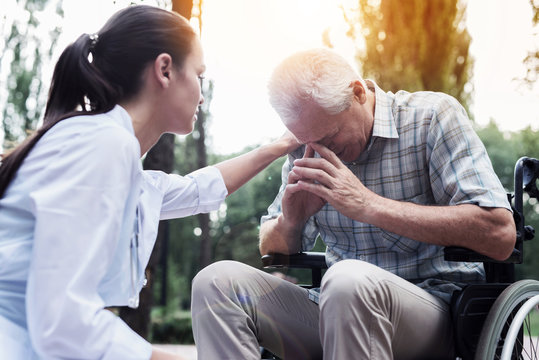 The doctor put his hand on the shoulder of the brooding old man