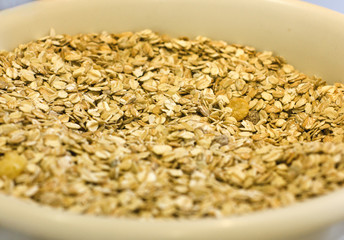Oat flakes in a white ceramic bowl