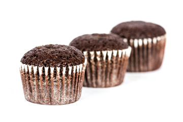 Chocolate muffins on white background