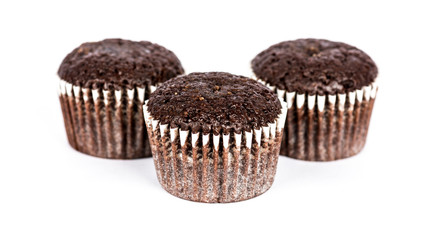 Chocolate muffins on white background