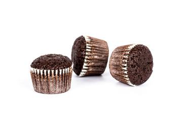 Chocolate muffins on white background