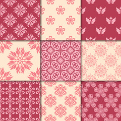 Cherry red and beige floral ornaments. Collection of seamless patterns