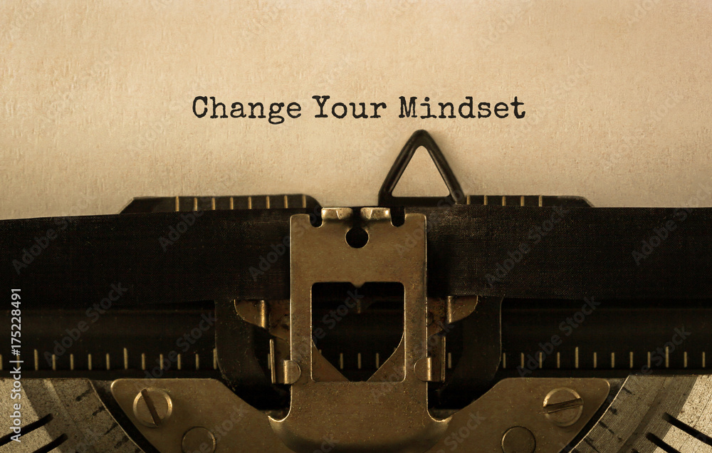 Poster text change your mindset typed on retro typewriter