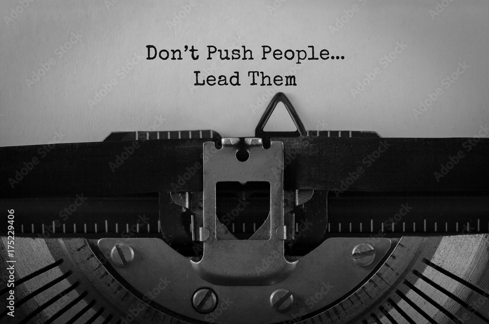 Poster text dont push people lead them typed on retro typewriter